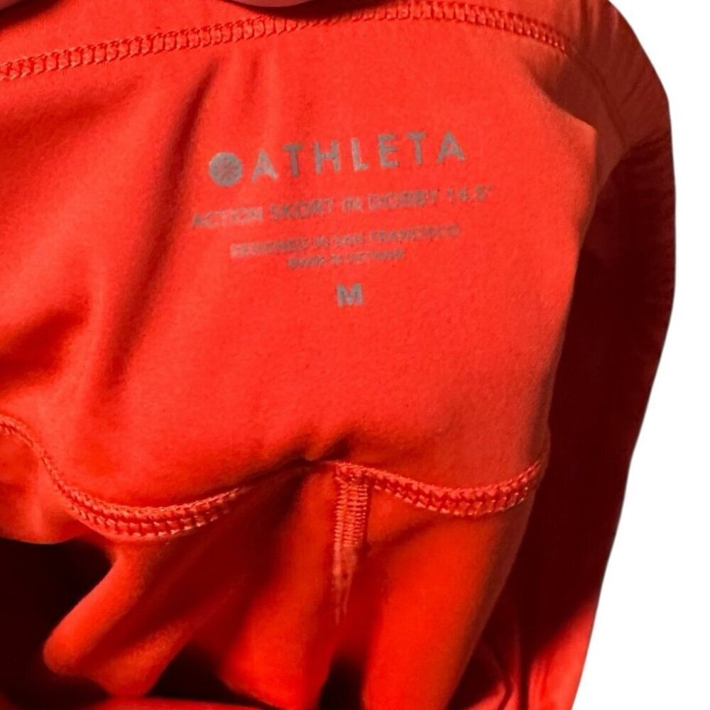 Athleta Action Skort in Dobby 14.5” Medium Skirt Short Athletic Orange Pockets - Picture 3 of 6